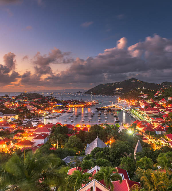Gustavia, Saint Barthelemy skyline and harbor in the West Indies of the Caribbean at dusk.